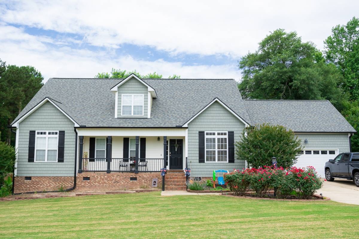 Odyssey Contracting featured roofing and siding project, after photo 1